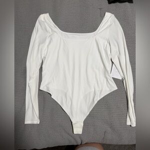 Lululemon Athletica White Long Sleeve Bodysuit